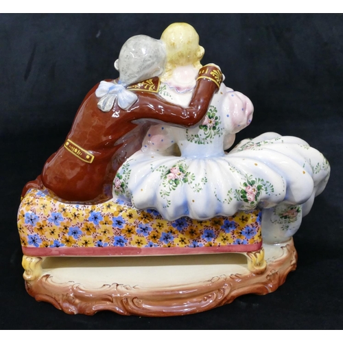 81 - A Continental large china group of 2 seated lovers, 29cm wide