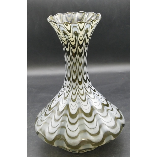 84 - A Loetz round bulbous thin necked trumpet shaped glass vase with white swirl decoration, 27cm high