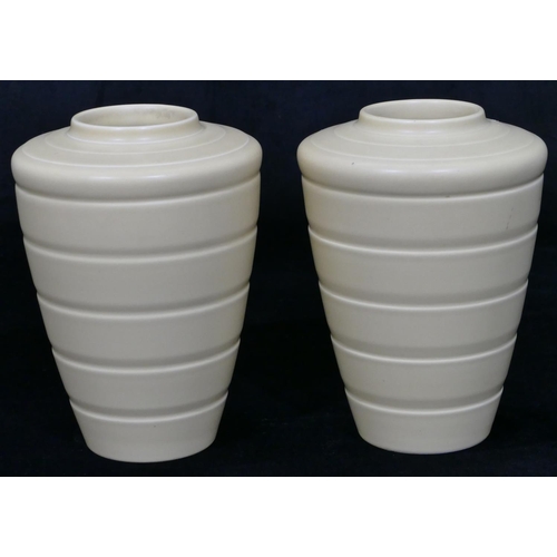 88 - A pair of Art Deco Keith Murray for Wedgwood yellow round tapering vases, Model 3805, circa. 1930, 1... 