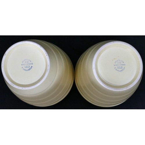 88 - A pair of Art Deco Keith Murray for Wedgwood yellow round tapering vases, Model 3805, circa. 1930, 1... 