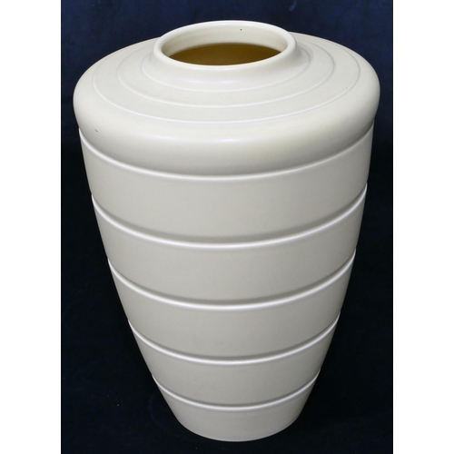 89 - An Art Deco Keith Murray for Wedgwood yellow round tapering vase, Model 3805, circa. 1930, 29cm high