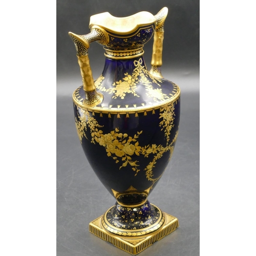 92 - A 19th Century Royal Crown Derby round bulbous thin necked 2-handled trumpet shaped vase on royal bl... 