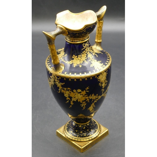 92 - A 19th Century Royal Crown Derby round bulbous thin necked 2-handled trumpet shaped vase on royal bl... 