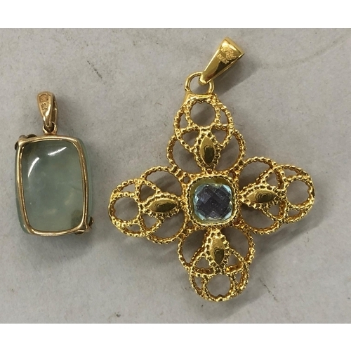 446 - A 9ct gold pendant set with pale blue hardstone, also a cross pendant set with pale blue stone and p... 