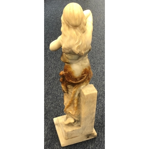 623 - A marble figure of a standing part naked lady on square base (unsigned), 60.5cm high