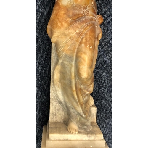 623 - A marble figure of a standing part naked lady on square base (unsigned), 60.5cm high