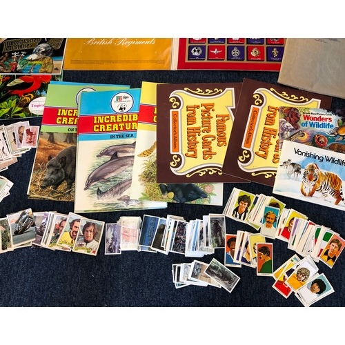 7032 - A large quantity of Trade Cards, PG Tips, Brooke Bond etc and a Texaco 