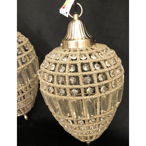 8137 - A pair of modern hanging lamps, lamps 47cm long overall, chain approx. 96cm long