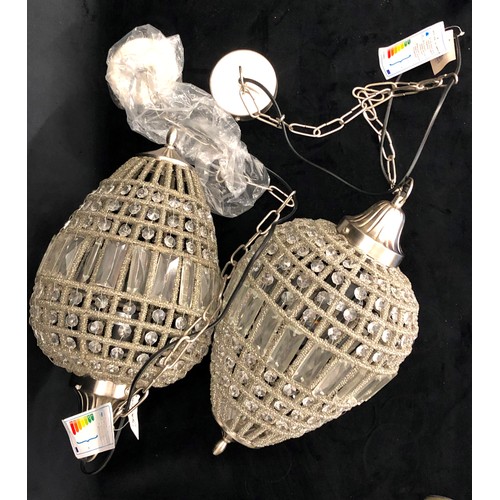 8137 - A pair of modern hanging lamps, lamps 47cm long overall, chain approx. 96cm long