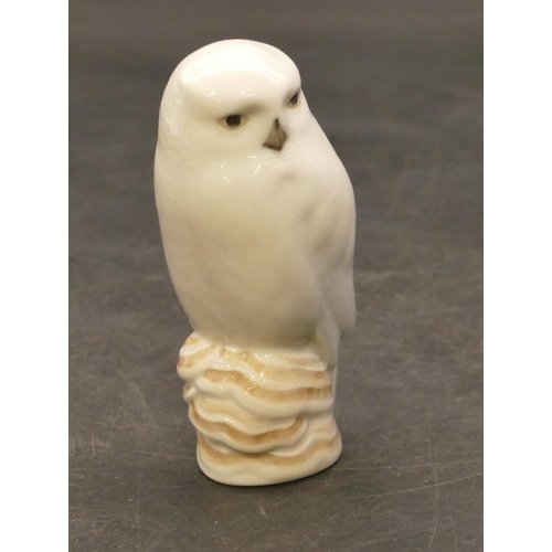 121 - A Royal Copenhagen figure of a perched owl, no. 113, 9cm high