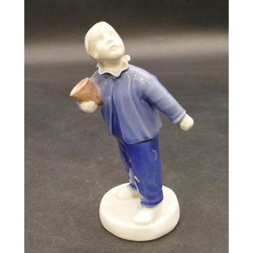 122 - B & G Copenhagen figure of a young standing boy holding a pot, no. 2251, 15.5cm high