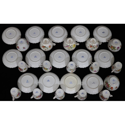 137 - A set of 10 Dresden coffee cups and saucers on white ground with multicoloured floral, leaf and gilt... 