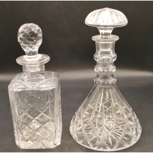 147 - A heavy cut glass round bulbous thin necked decanter with mushroom shaped stopper, 27.5cm high, a sq... 