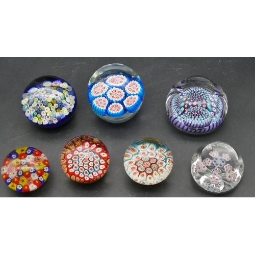 175 - A Millefiori bulbous shaped paperweight with circular chamfer decoration, 8cm diameter, 6 various Mi... 