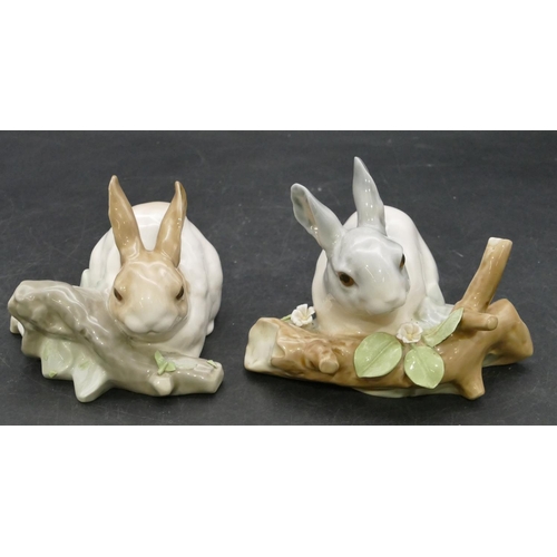 189 - A pair of Lladro figures of rabbits (some damage to encrusted flowers), 8.5cm high