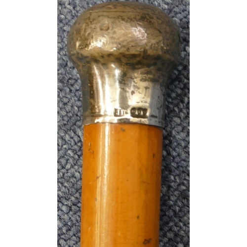 225 - A London silver handled walking cane (knob handle dented)