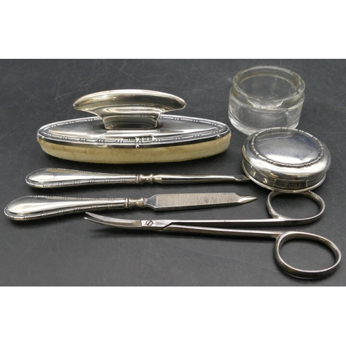 229 - A 5-piece Birmingham silver manicure set in fitted black leather case (scissors not silver)