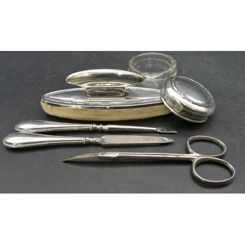 229 - A 5-piece Birmingham silver manicure set in fitted black leather case (scissors not silver)