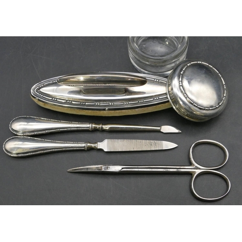 229 - A 5-piece Birmingham silver manicure set in fitted black leather case (scissors not silver)