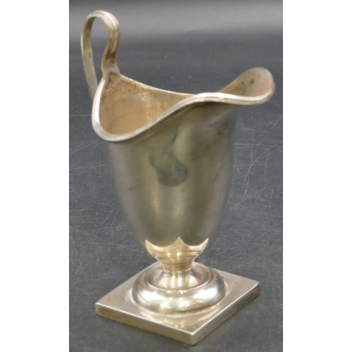 231 - A Chester silver milk jug on square base, 12.5cm high, 3.6oz