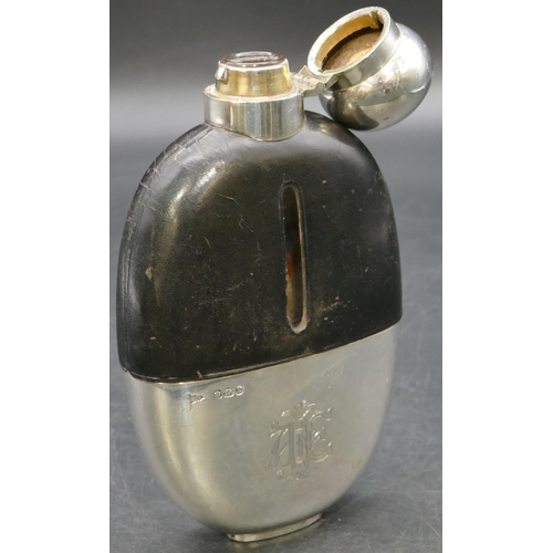 232 - A Victorian glass, leather and silver mounted concave shaped hip flask in detachable case, engraved ... 