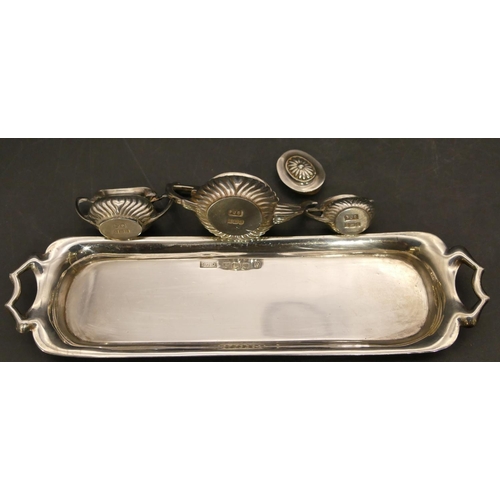 243 - A modern Birmingham silver miniature doll's tea service with rectangular shaped 2-handled tray, 15cm... 