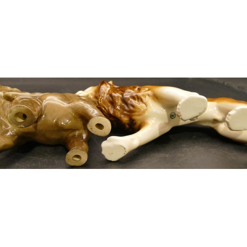 54 - A Royal Dux figure of a prowling lion, 22.5cm long and a china figure of an elephant, 9.5cm high