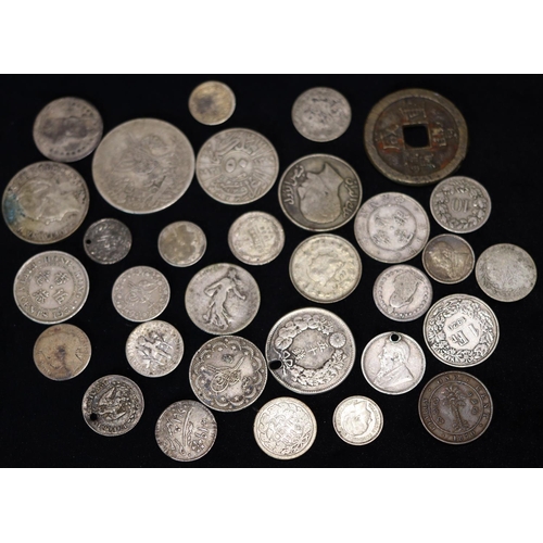 608 - An Oriental bronze coin and a small quantity of various Oriental and other coins, mostly silver