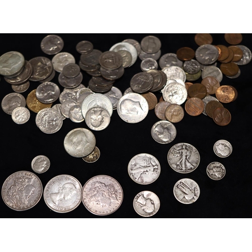 609 - 2 19th Century American silver Dollars, 1885 and 1878, a Canada Dollar, 1960, 2 Half Dollars, 1942 a... 