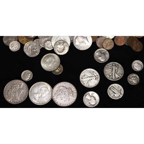 609 - 2 19th Century American silver Dollars, 1885 and 1878, a Canada Dollar, 1960, 2 Half Dollars, 1942 a... 