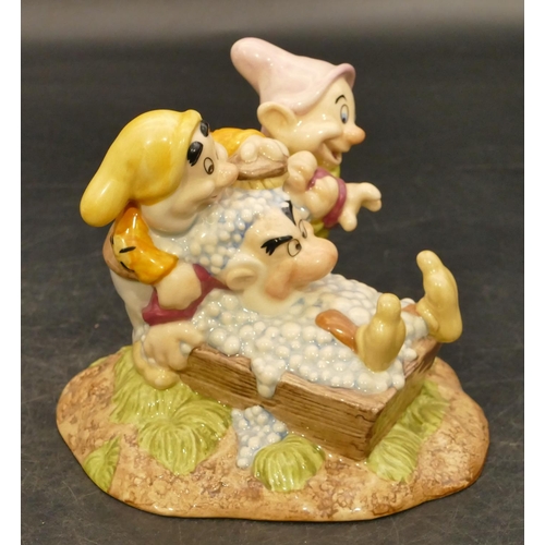 65 - A Royal Doulton Snow White group 