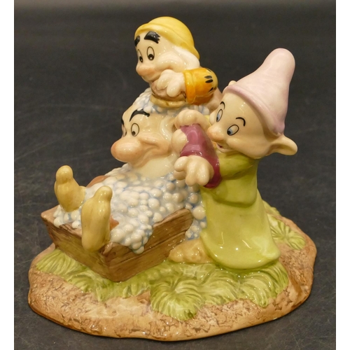 65 - A Royal Doulton Snow White group 