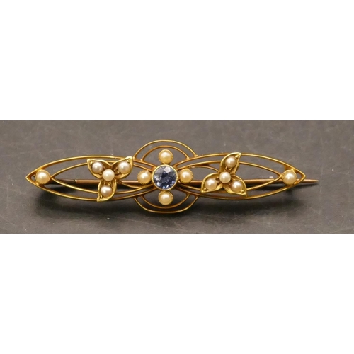 652 - A 15ct gold brooch set with centre sapphire and seed pearls, 4.4cm wide, 3.5 grams gross