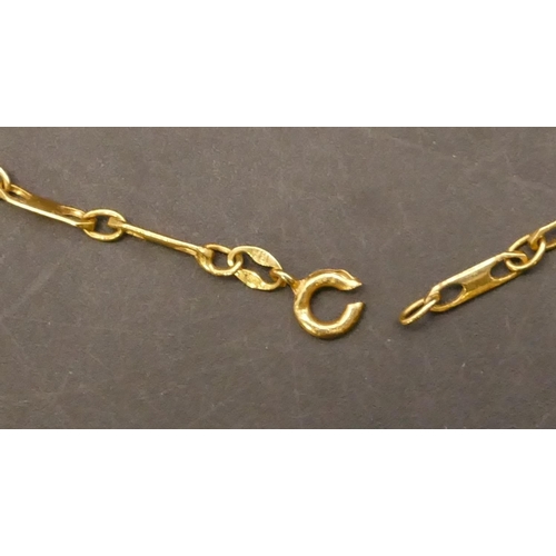 668 - An 18ct gold rectangular linked bracelet, 18.5cm long, 3.4 grams