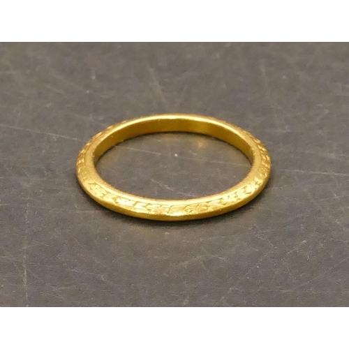 671 - A 22ct gold wedding ring, Size K, 2.5 grams