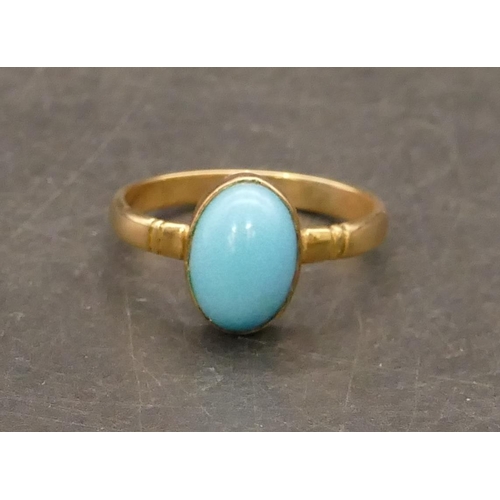 674 - A gold ladies' ring set with oval turquoise, Size N/O, 2.3 grams gross