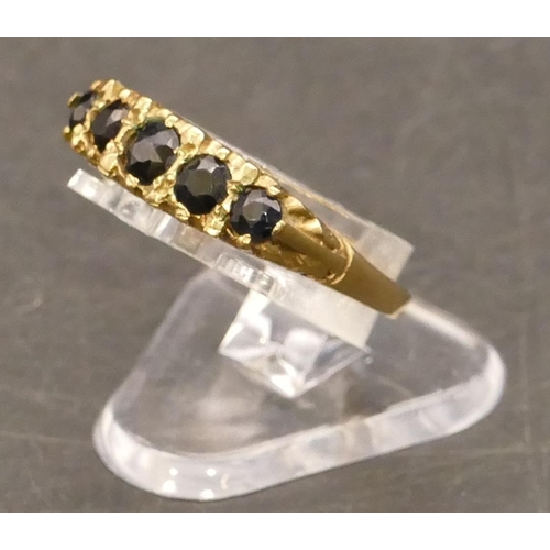 675 - A 9ct gold ladies' stone and sapphire ring, Size L/M