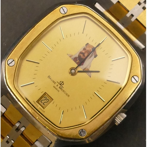 682 - A Baume & Mercier Geneva Quartz steel Gent's wristwatch with gilt dial depicting figurehead 