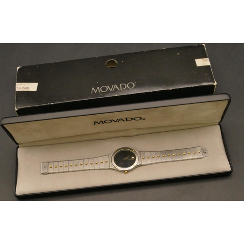 687 - Movado Gent's steel Quartz wristwatch with matching 2-tone strap bracelet (boxed with certificate)