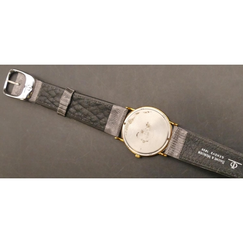 692 - Baume & Mercier Geneva Quartz Gent's circular wristwatch with white enamel dial and grey leather str... 