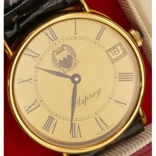 695 - A Baume & Mercier 18ct gold Gent's circular Asprey wristwatch with gilt dial and calendar, sapphire ... 