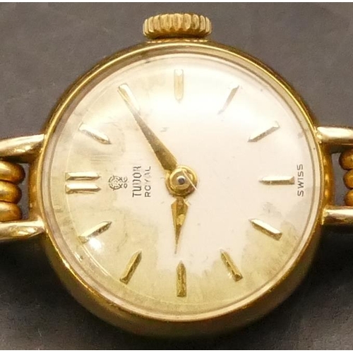 699 - A Tudor Royale ladies' circular 9ct gold wristwatch with matching strap bracelet, stamped 