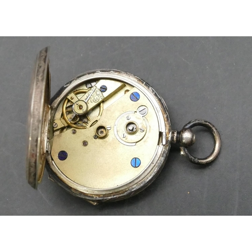 712 - A 935 silver coloured metal fob watch 