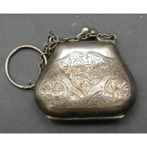 715 - A Birmingham silver miniature purse and chain with chased leaf and scroll decoration, hinged lid enc... 