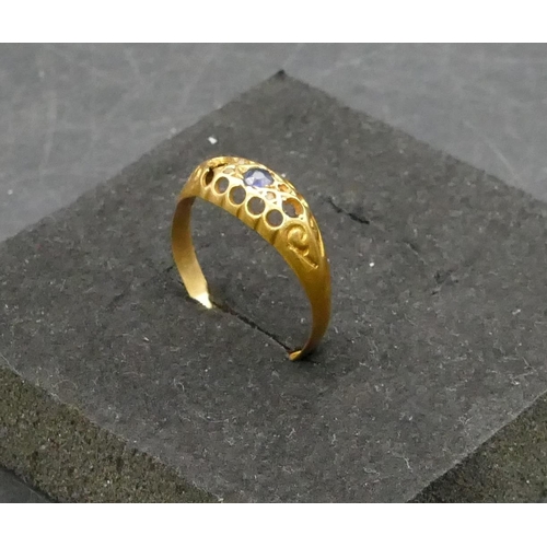 752 - An 18ct gold ring set with centre sapphire (other stones missing), Size Q/R, 1.7 grams gross