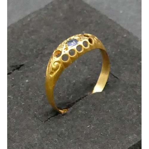 752 - An 18ct gold ring set with centre sapphire (other stones missing), Size Q/R, 1.7 grams gross