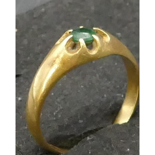 754 - A gold solitaire ring set with centre green stone, Size T/U, 5.4 grams gross