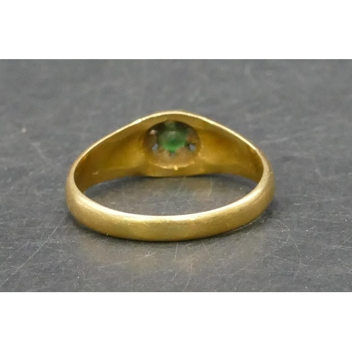 754 - A gold solitaire ring set with centre green stone, Size T/U, 5.4 grams gross