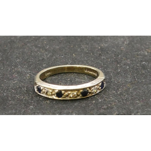 768 - A 9ct gold half eternity ring set with 4 small sapphires interspersed by small diamonds, Size L, 2.9... 