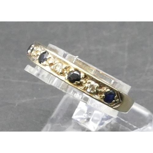 768 - A 9ct gold half eternity ring set with 4 small sapphires interspersed by small diamonds, Size L, 2.9... 